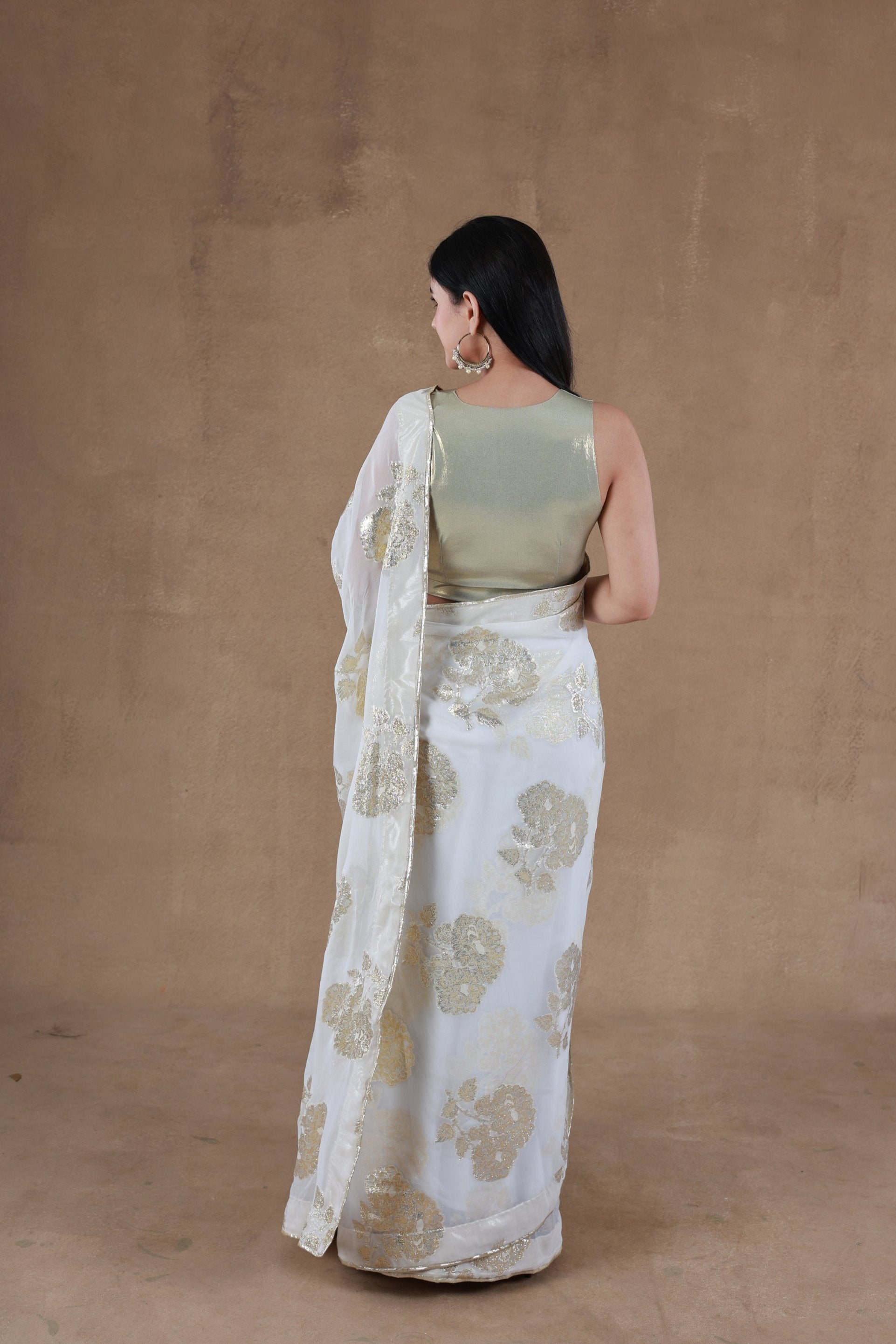 Model in Slay Official Aurora Gold Foil Saree designed by Simar, showcasing a back pose.