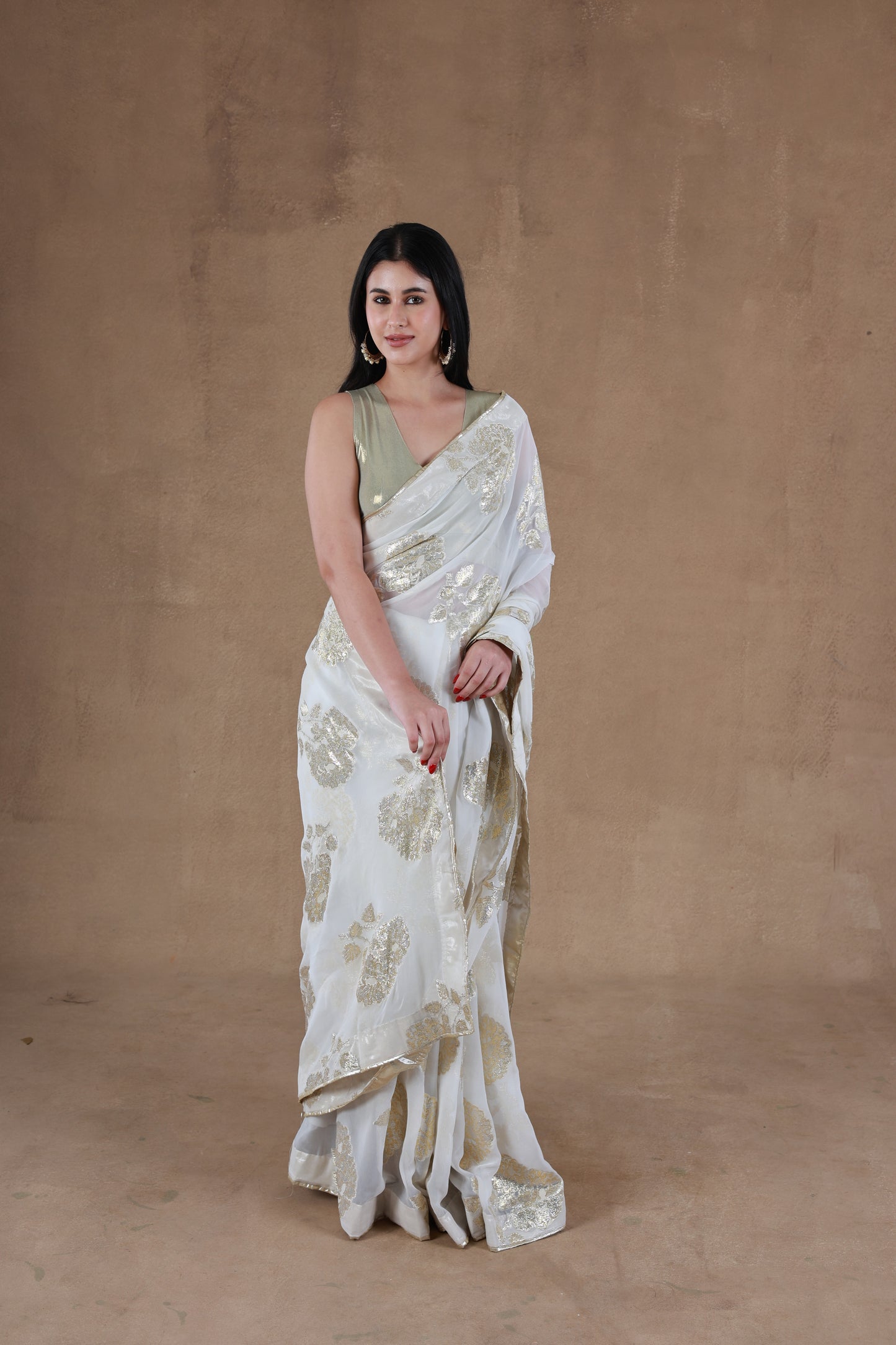 Model in Slay Official Aurora Gold Foil Saree designed by Simar, showcasing a front pose detailing the saree and blouse.